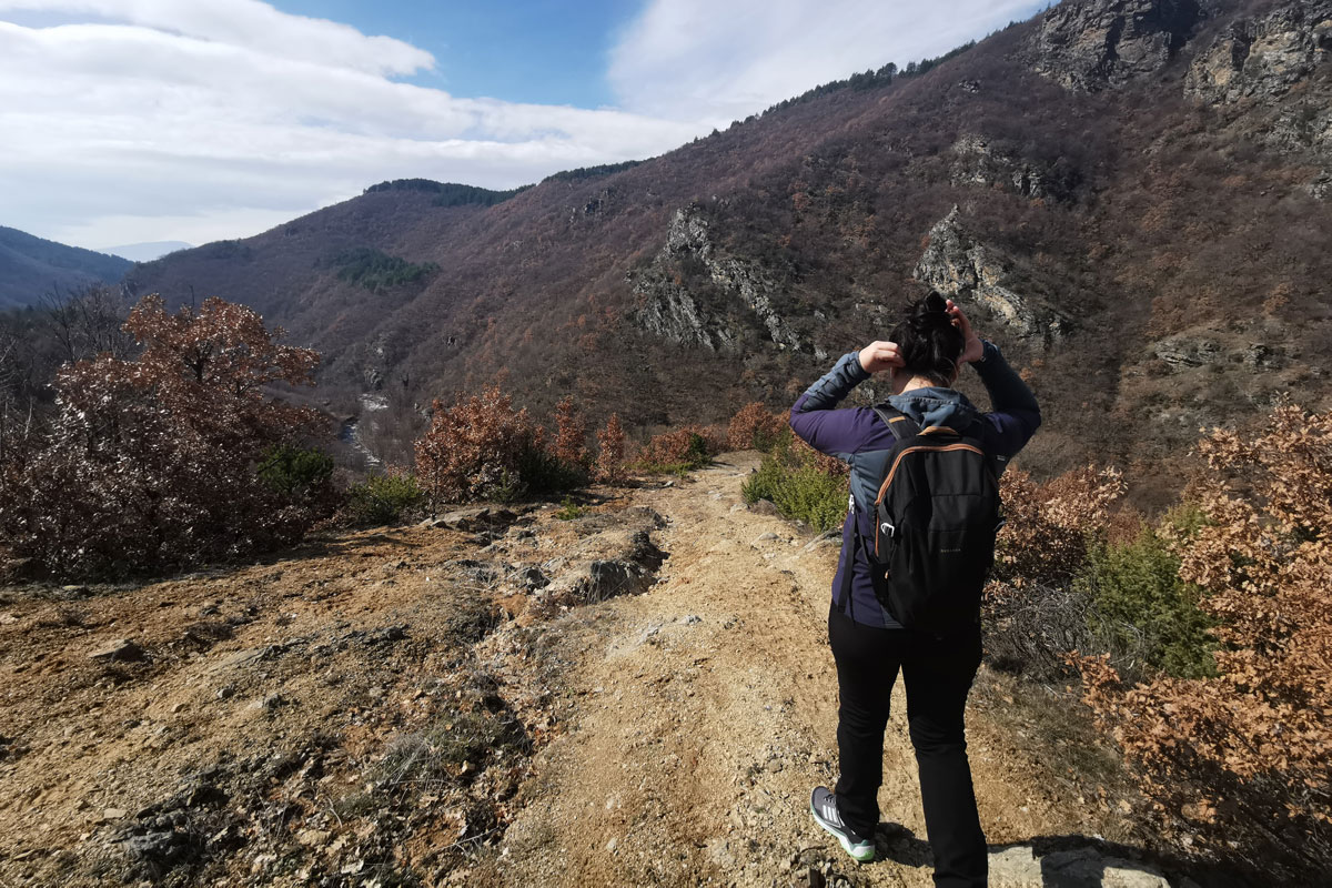 Hiker woman backpack mountain